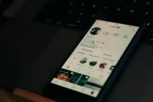 A person reading social media news on a phone